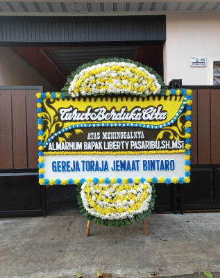Papan Bunga Duka di Kotamobagu